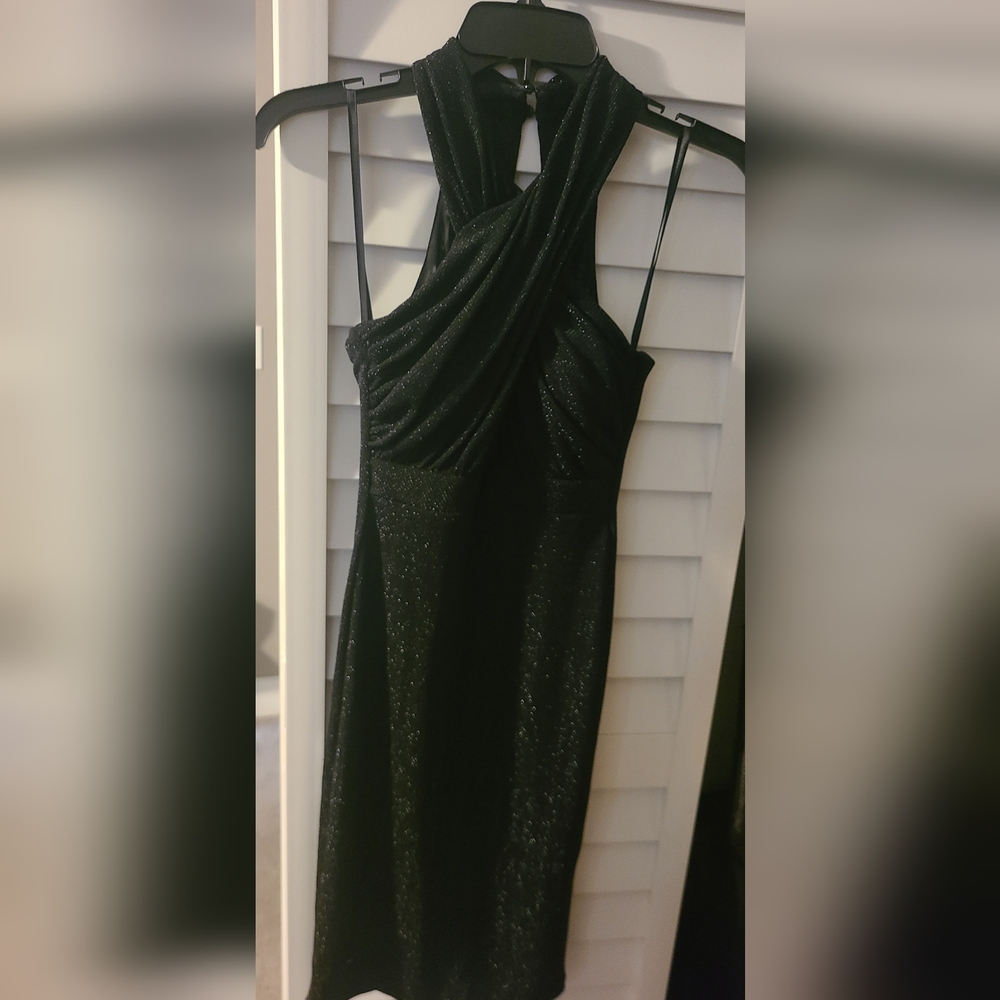 Black with shimmering glitter look. Xs like new worn once very comfortable fancy